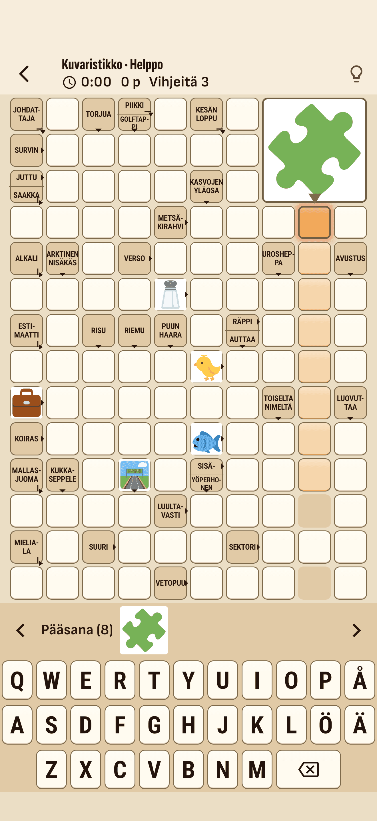 A picture crossword: the clues sit in the grid next to arrows, some of them are pictures, and the big picture hints at the main word. Below are the clue bar and a keyboard with Ä, Ö and Å.